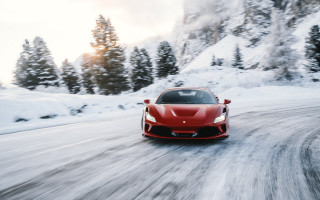 Red sports car snowy mountain 2 - the background and a sun free wallpaper