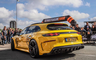 Yellow sportscar streetSign crowd panfuturism - a street sign free wallpaper