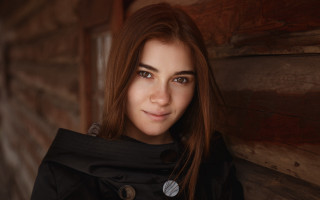 Woman longhair blackjacket logcabin portrait - a wooden wall free wallpaper for desktop