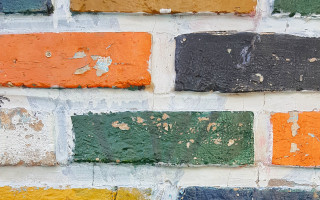 Brickwall painted clock neo fauvism - different color of paint free wallpaper