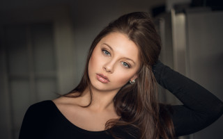 Woman longhair blackshirt earrings portrait - free portrait wallpaper for desktop