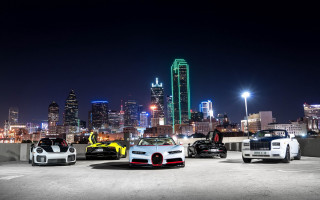 Cityscape luxury parked cars night - a group of cars free wallpaper for desktop