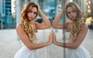 Two women mirror portrait blonde - their back free wallpaper