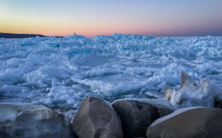 Ice water rocks dawn landscape - evaline ness free wallpaper