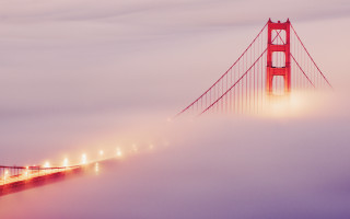 Foggy bridge lights volumetric sunset - a foggy sky behind free wallpaper
