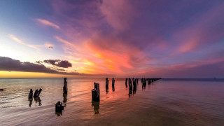 Pier beach sunset clouds lighthouse - a long pier free wallpaper