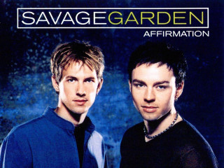 Two men standing blue background - transgressive free wallpaper