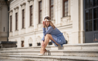 Woman bluecoat sitting architecture blurry - art nouveau free wallpaper