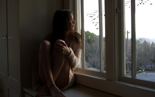 Woman sitting by window outside - the window sill free wallpaper for desktop