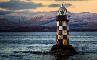 Lighthouse rock lake mountains sunset - alexander johnston free wallpaper for desktop
