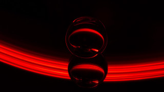 Stoplight glowing red eyes anamorphic - a red light in the background free wallpaper