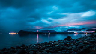 Rocky beach mountains night cloudy - a body of water and mountains free wallpaper