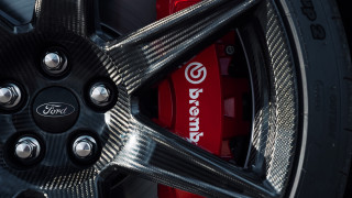 Tire closeup red brakepad car - extreme detail free wallpaper