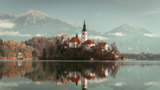 Church island lake mountains clouds 2 - a small island in the middle of a lake free wallpaper
