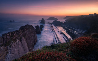 Sunset rocky coastline lighthouse beautiful - a rocky coastline free wallpaper
