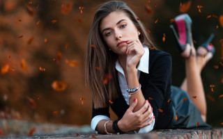 Woman brick wall cellphone autumn - her hand free wallpaper