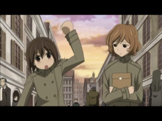 Two people street arms up - one person holding free wallpaper