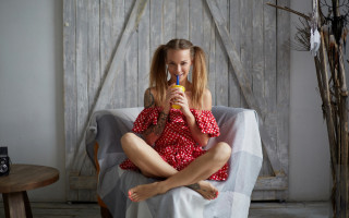 Woman sitting beverage blonde curtains - a cup free wallpaper