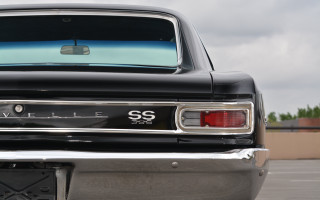 Black car chrome license sky - a black car free wallpaper