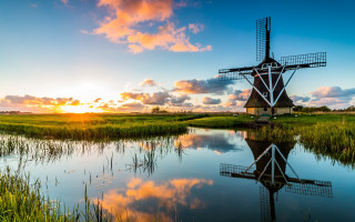Windmill lake sunset field landscape - a windmill free wallpaper