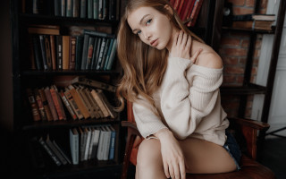 Woman sitting library book shelf - book free wallpaper for desktop