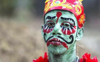 Painted man red flower photorealistic - a red flower free wallpaper