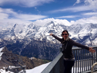 Woman balcony mountain ski lift - a balcony free wallpaper