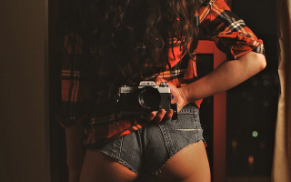 Woman shorts camera posing denim - free vintage wallpaper for desktop