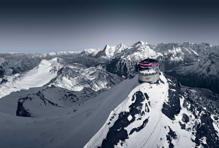 Snowboarder jumping snowy mountain peak - a snowboarder free wallpaper