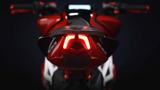 Red motorcycle closeup futurism rendering - a red motorcycle free wallpaper