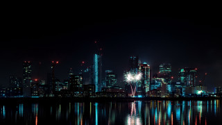 City skyline fireworks reflection nightscape - a city skyline free wallpaper