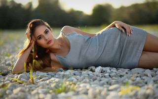 Woman rock ground crossed posing - a rock free wallpaper for desktop