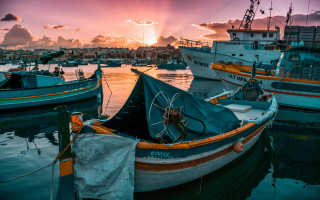 Harbor boats sunset city skyline - a harbor free wallpaper