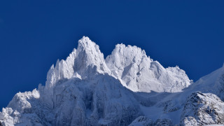 Snow mountain blue sky clouds 4 - a clear blue sky in the background free wallpaper