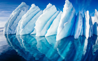 Icebergs reflection blue sky matte - a group of icebergs free wallpaper