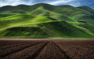 Green mountain plowed field blue - a green mountain free wallpaper