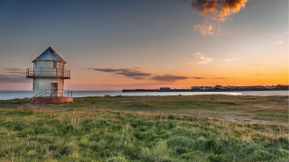 Lighthouse grassy field ocean sunset - grassy free wallpaper for desktop