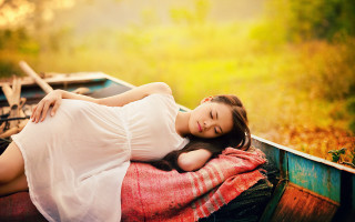 Woman boat water smile autumn - a smile free wallpaper for desktop