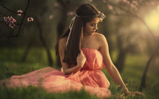 Pink dress woman flower grass - her hair and a flower free wallpaper