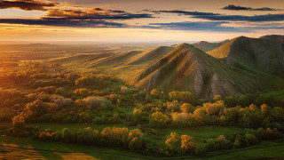 Mountain range forest sunset clouds 3 - the foreground and a sunset in the background free wallpaper for desktop