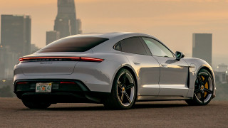 Silver porsche taytay city skyline - side profile free wallpaper