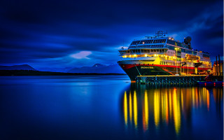 Large boat pier night mountain - evaline ness free wallpaper