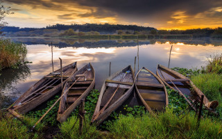 Boats grass water cloudy sky - a couple of boats free wallpaper
