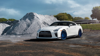 White sports car parking lot 23 - a white sports car free wallpaper for desktop