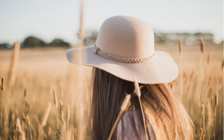 Woman white hat wheat grass - evaline ness free wallpaper