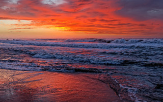 Sunset ocean waves beach distant 2 - the beach in the distance free wallpaper