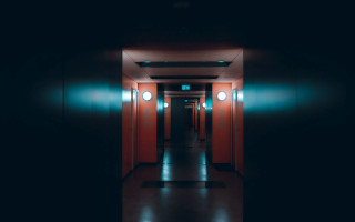 Long hallway red walls black - two lamp free wallpaper