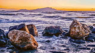 Rocks beach ocean sunset mountain - top of a beach next free wallpaper