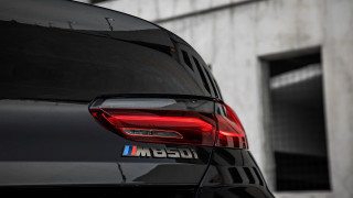 Bmw tail light panfuturism 3d - a black car free wallpaper