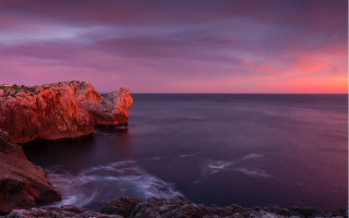 Rocky cliff water sunset mystical - a rocky cliff free wallpaper